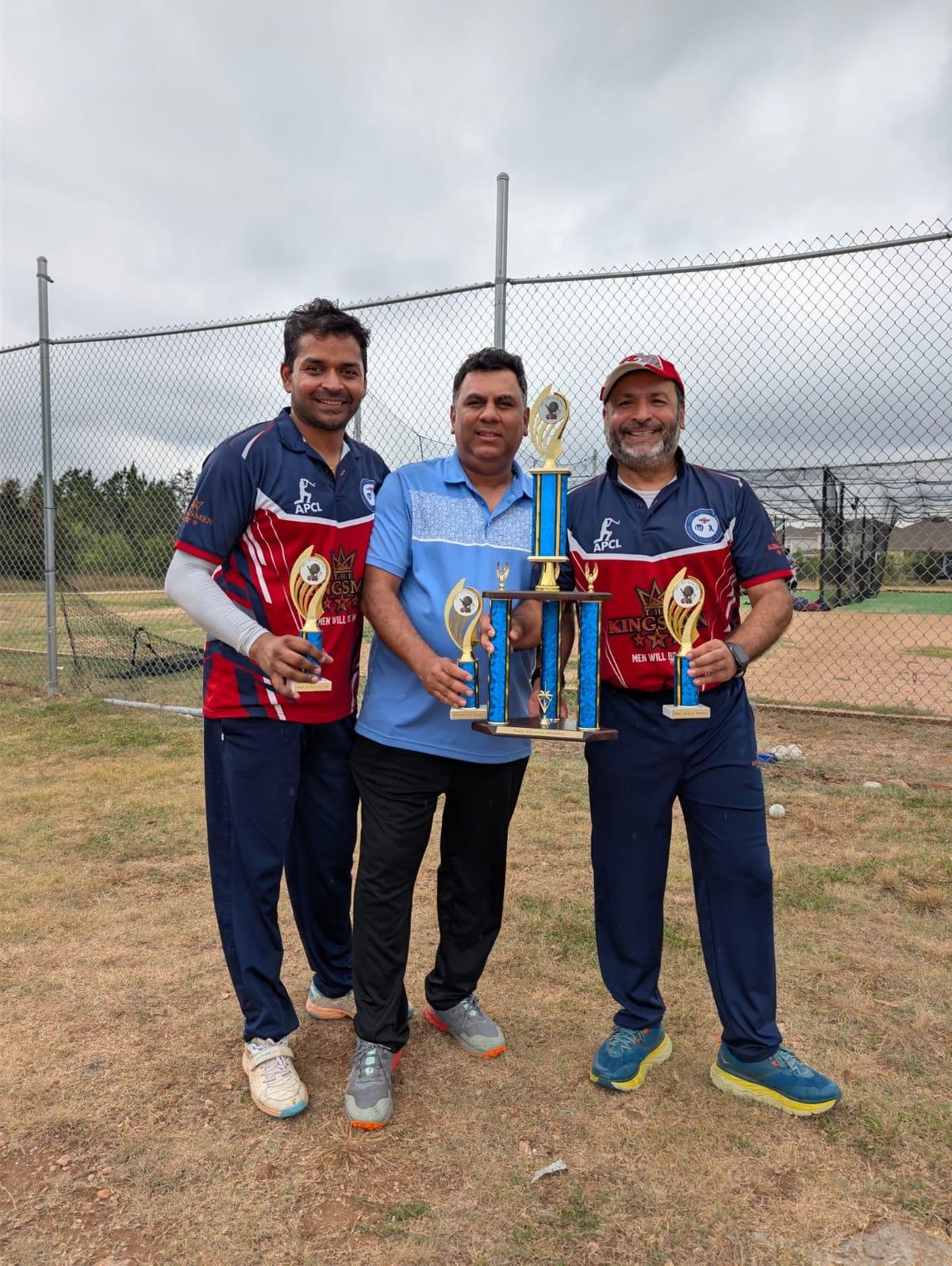 Three cheers — Hemant, Sandeep, and Akash with the spoils of victory.